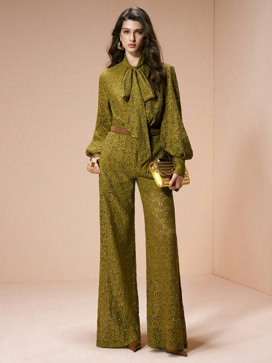 Full front view of olive floral-lace tie-neck blouse and wide-leg pants set styled for formal evenings