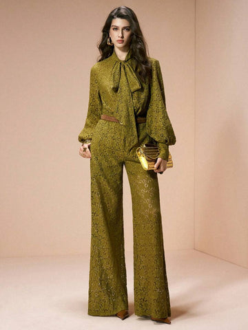 Full front view of olive floral-lace tie-neck blouse and wide-leg pants set styled for formal evenings