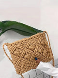 This stylish woven crossbody bag is perfect for your next vacation or casual outing. With its versatile design, it can easily transition from day to night. Its spacious interior and durable construction make it a must-have for your travels. Say goodbye to bulky bags and hello to effortless style.