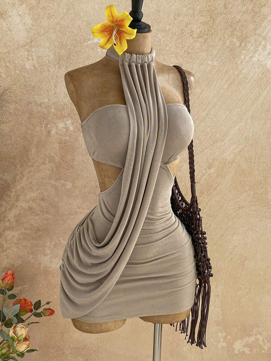 Effortlessly chic and versatile, this wrap asymmetric mini dress is your go-to piece for warm-weather occasions. The flattering wrap silhouette creates a defined waistline while the asymmetric hemline adds modern flair. Perfect for romantic dates, garden gatherings, or vacation adventures, it transitions seamlessly from day to night.
