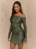 Get ready to party like it's Y2K in this futuristic off-shoulder mini dress! With elegant ruching and a bodycon fit, you'll stand out at any St. Patrick's Day celebration. No need to take yourself too seriously, let this dress do the talking (and dancing) for you!