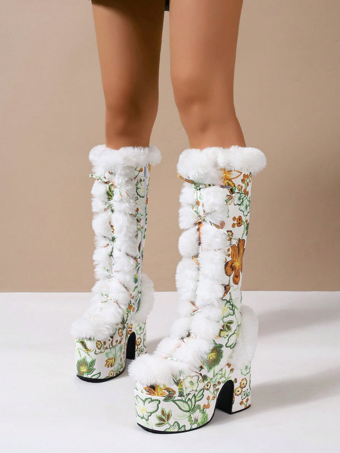 Step into the trendsetting world with our Y2K Punk Chic Knee-High Plush Thick Boots. Made for women who crave style and comfort, these boots not only make a statement with their unique design, but also provide warmth and coziness with their plush material. Elevate your wardrobe and be a trendsetter with these knee-high boots.