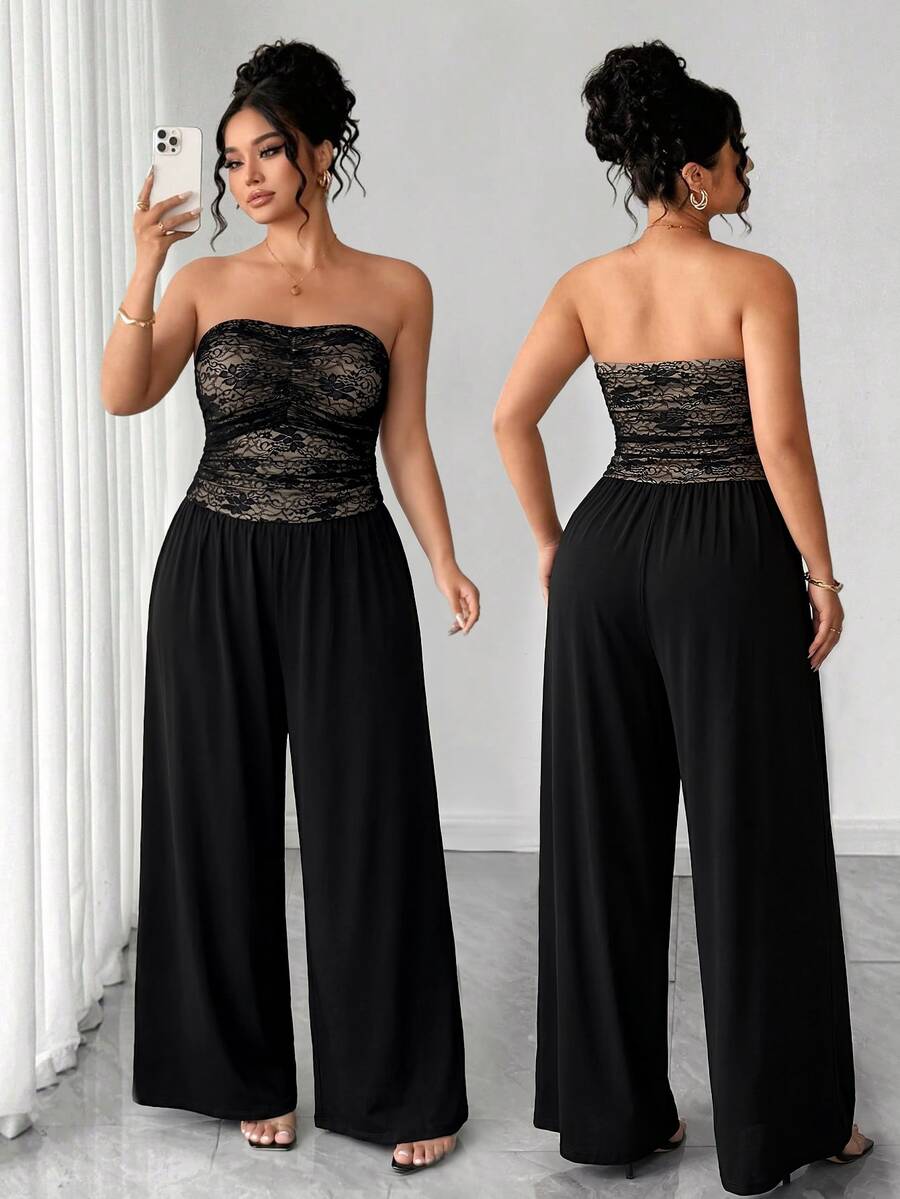 Front and back views of black jumpsuit showing strapless lace bodice and flowing trousers