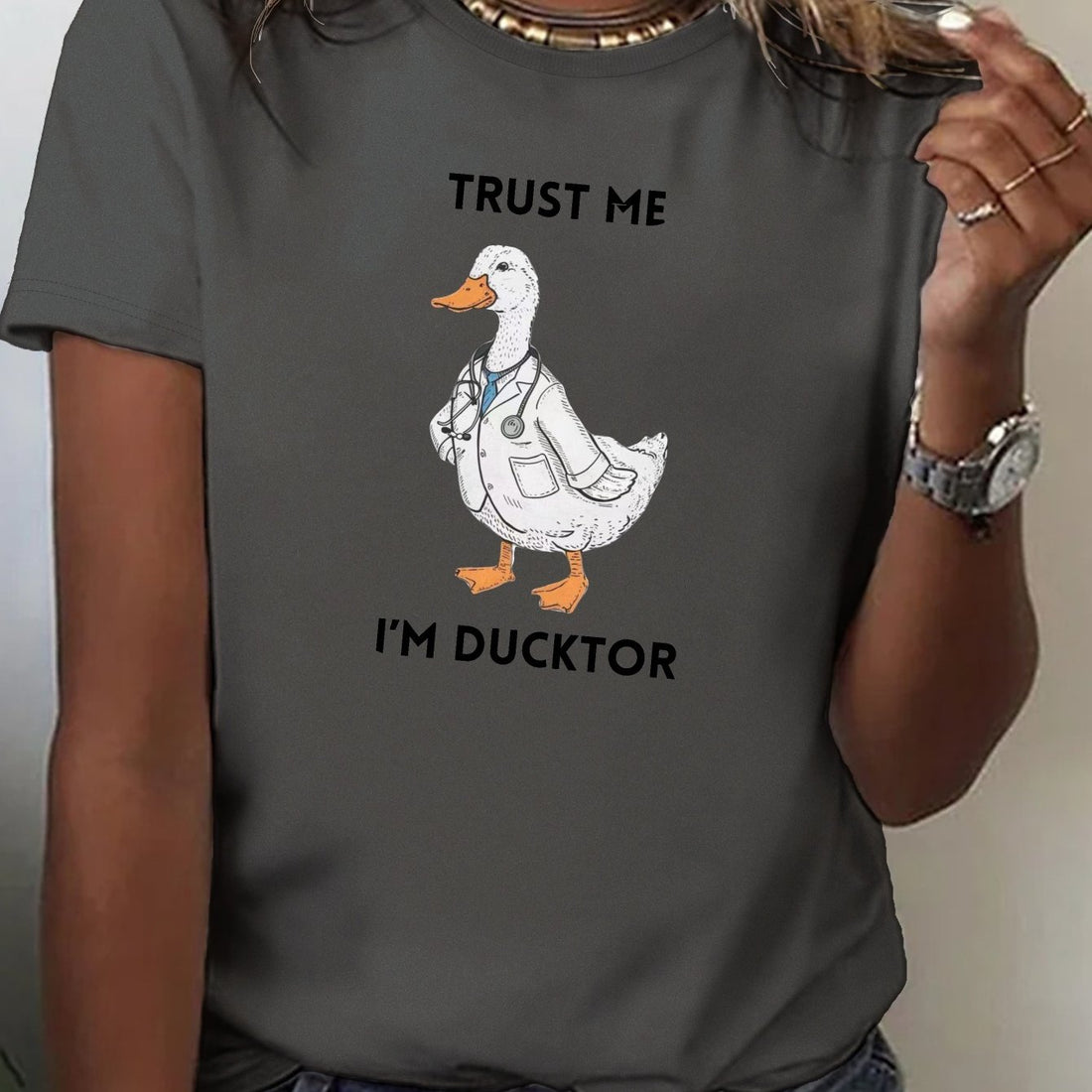 This Quirky Duck Doctor Cotton Tee is a must-have for any wardrobe! Made with breathable cotton and a comfortable fit, it's perfect for everyday wear. And with its fun design, it's sure to add a touch of whimsy to any outfit. Get yours today and show off your quirky sense of style!