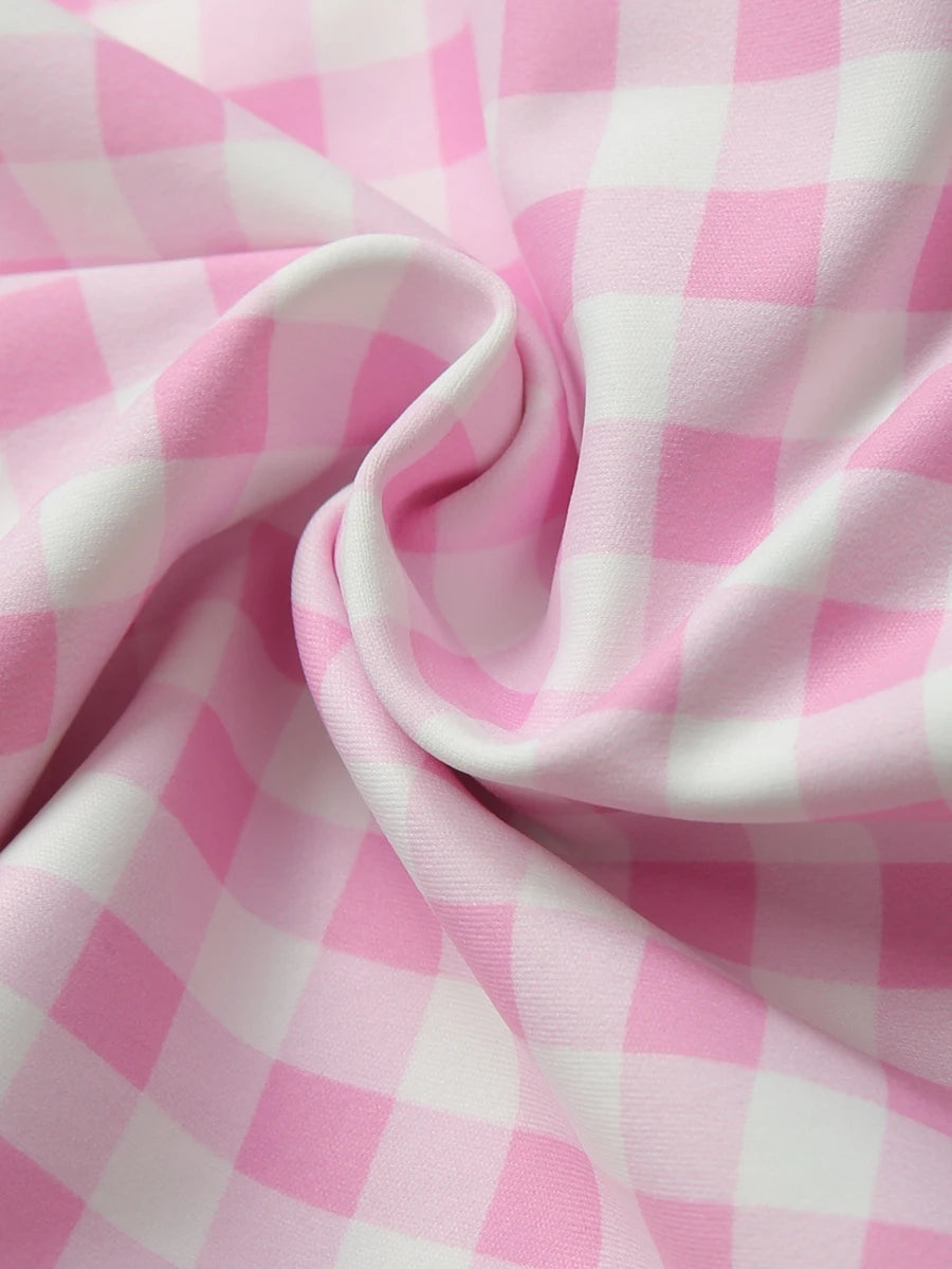 Pink and white plaid activewear tank with coordinating high-waisted shorts