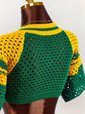 Back detail of green yellow openwork raglan sleeve knit crop top