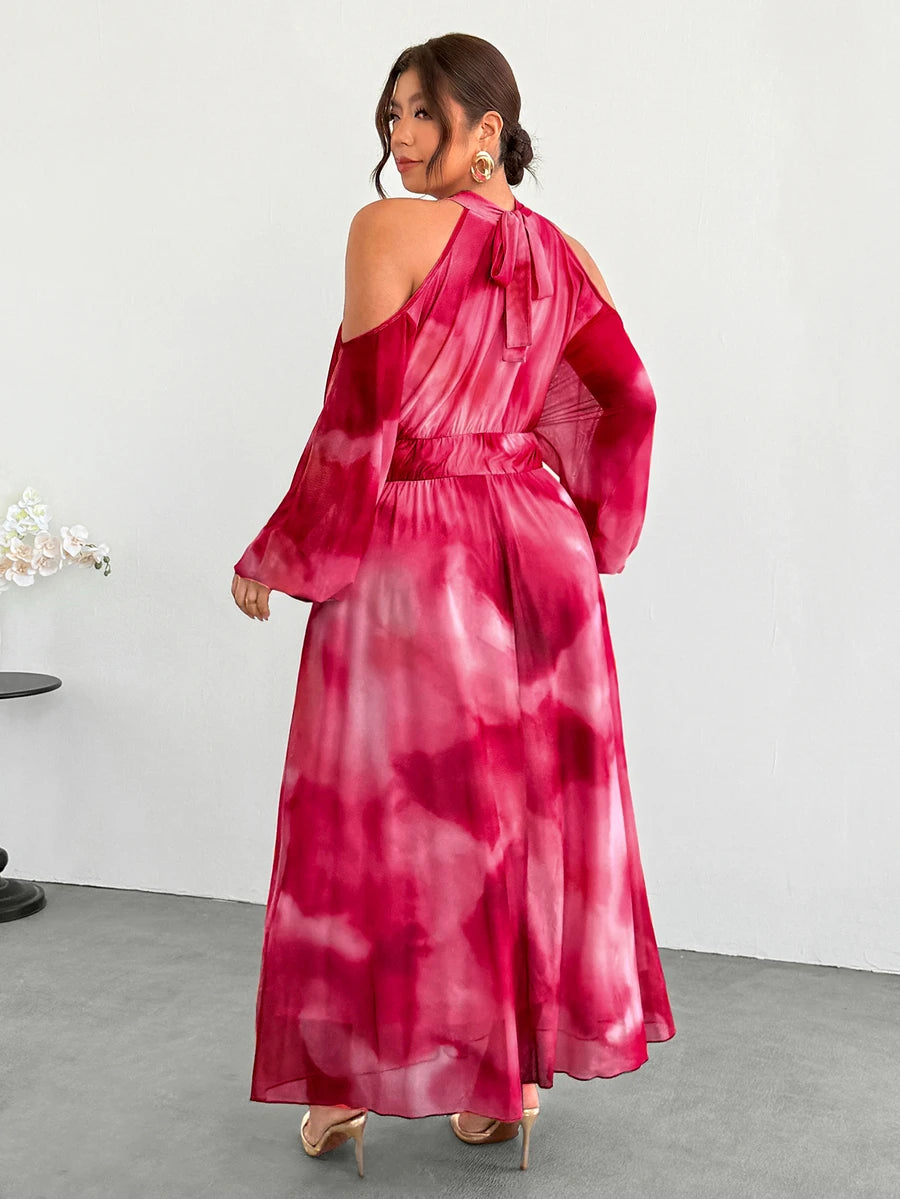 Back view of pink tie-dye halter tie-back maxi dress