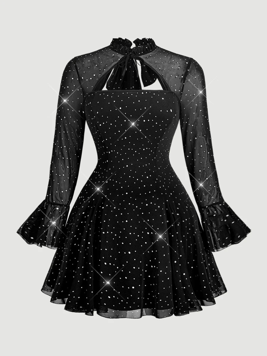 Front view of blue botanical floral mesh mini dress with fitted bodice and flared hem