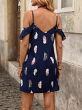 Back view of navy feather-print cold shoulder mini dress