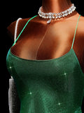 Close-up of green sparkly camisole bodice on fairy mini dress