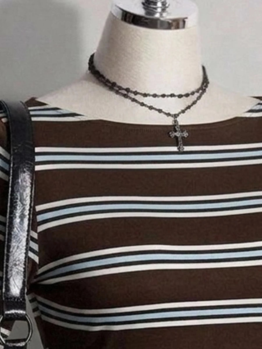 Close-up of brown striped knit dress neckline and horizontal stripe pattern