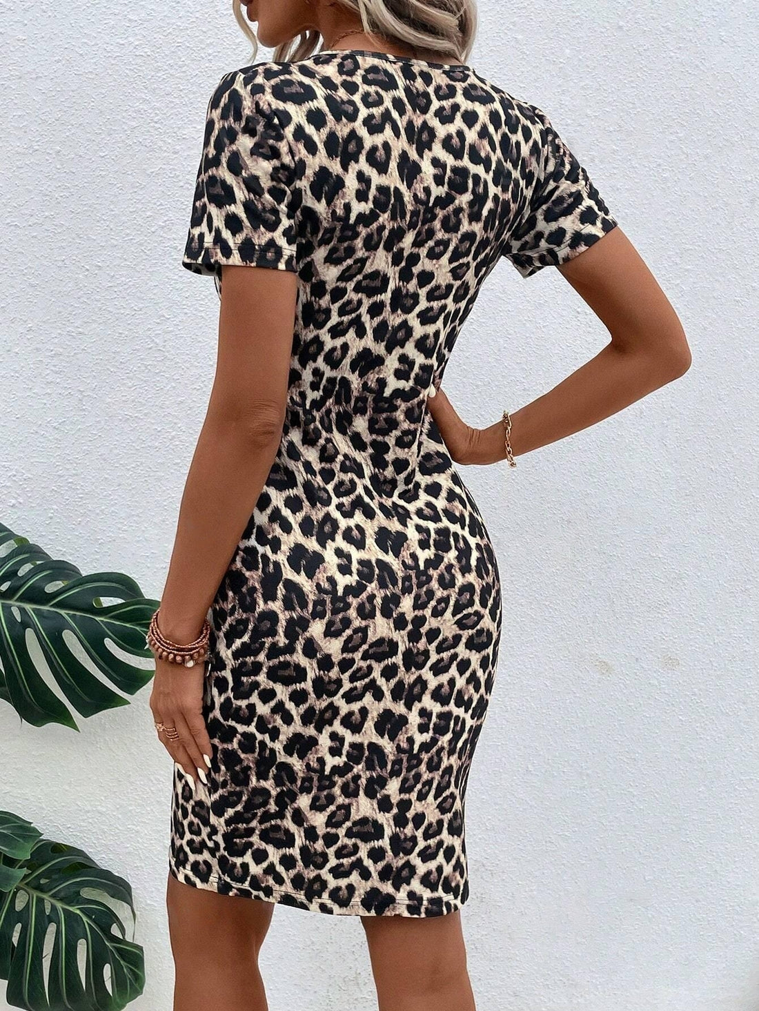 This Wildly Stylish leopard print dress is sure to make a statement. The keyhole design adds a touch of allure to the classic bodycon silhouette. Made from high-quality material, this dress is both comfortable and stylish. Perfect for any occasion, this dress will have you looking fierce and fashionable.