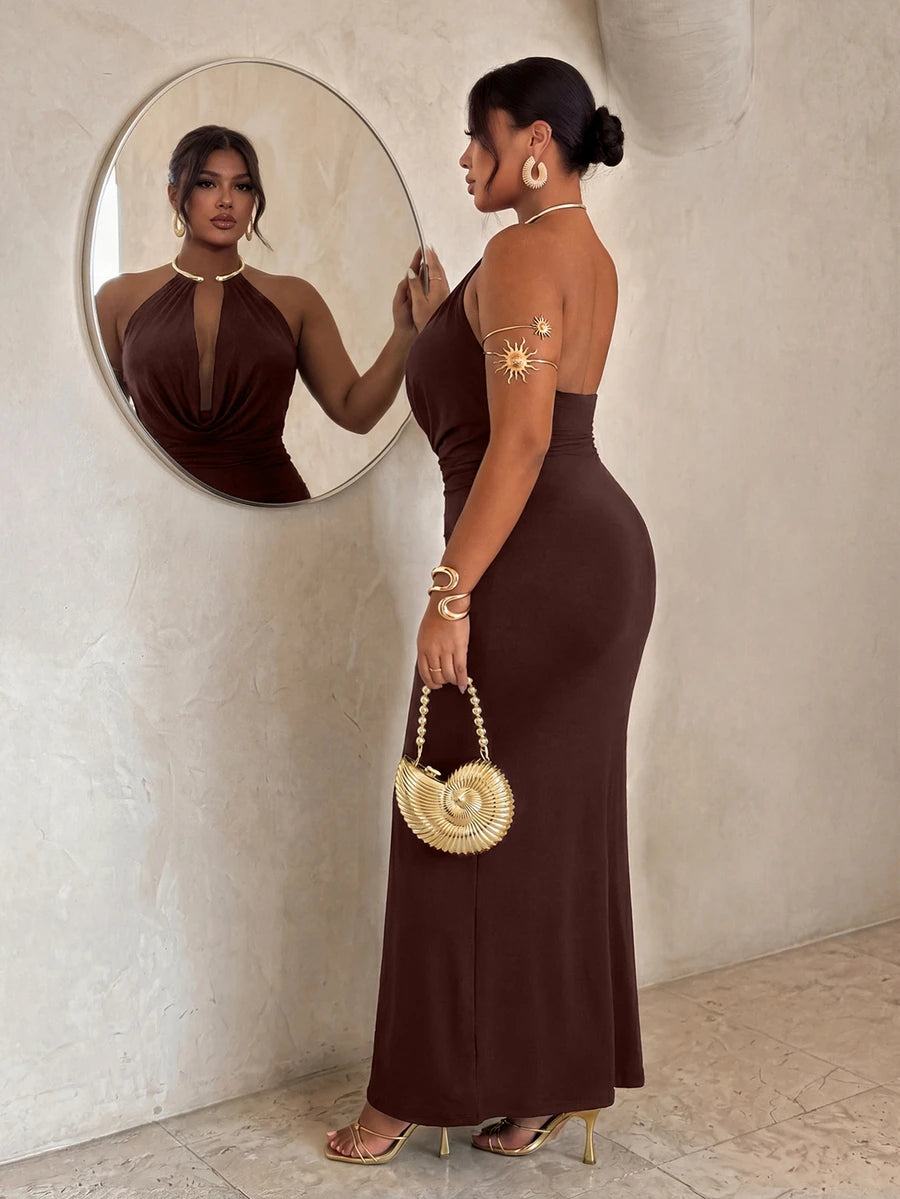 Side back view of brown backless halter maxi dress with fitted long skirt