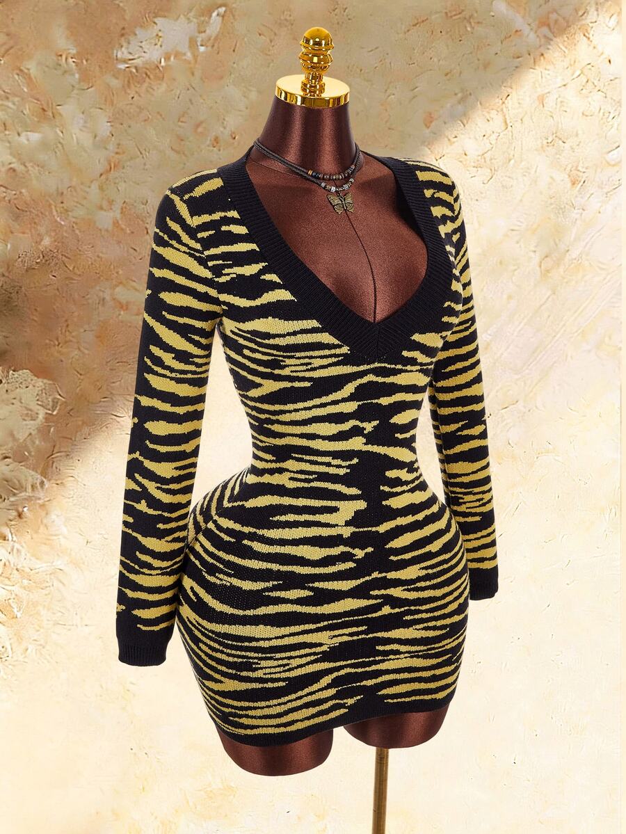Front product view of black and yellow tiger stripe deep V long sleeve knit dress