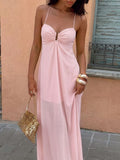 Close front view of baby pink keyhole gathered bodice maxi dress outdoors