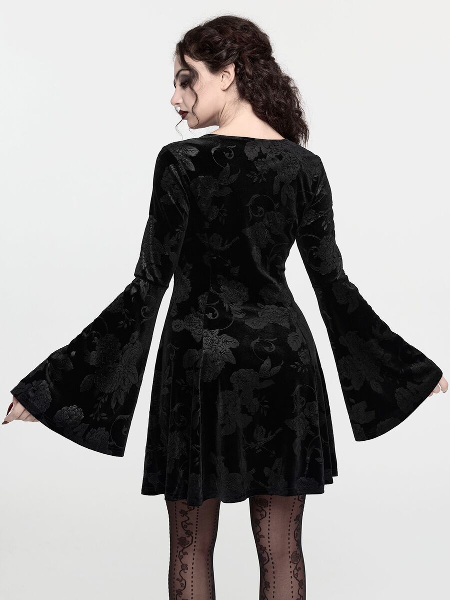 Front view of black velvet rose gothic mini dress with lace-trimmed V neckline and flared sleeves