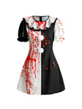Front view of black white harlequin mini dress with ruffle collar and puff sleeves