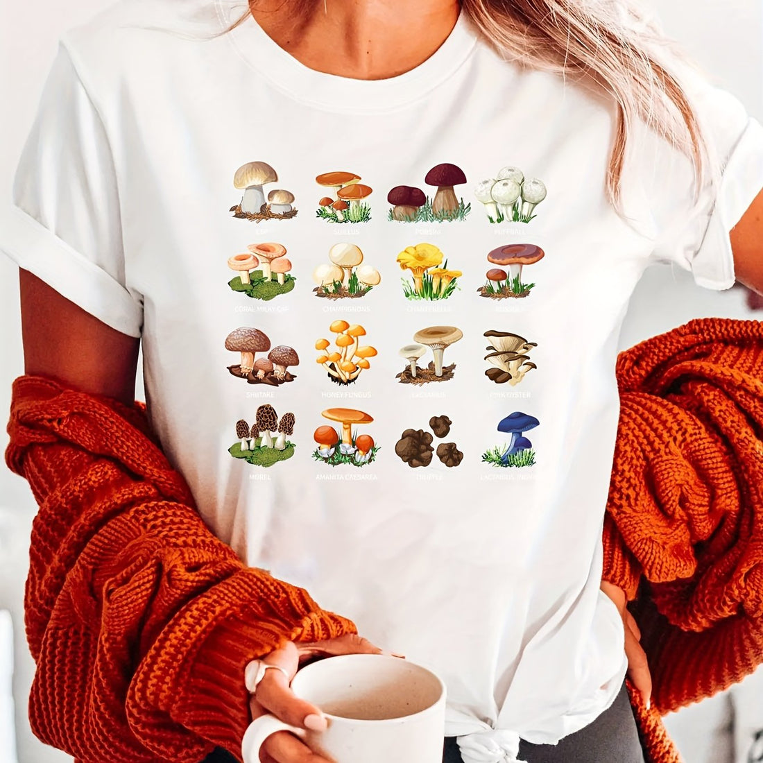 Experience the magic of mushrooms with this versatile Women's Casual Top. Made with a comfortable blend of fabrics and featuring short sleeves and a classic neck T-shirt design, this top is perfect for everyday wear. Add some fun and whimsy to your wardrobe with Mushroom Magic.
