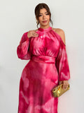 Close-up of pink tie-dye halter neckline and sheer bishop sleeves