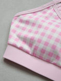 Detail of adjustable spaghetti straps and lined pink check sports top