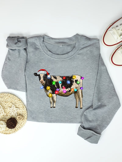 This Cow Print Pullover Sweatshirt is the perfect way to stay warm and cozy during the colder months. The design is both stylish and comfortable, with a soft fabric that keeps you insulated from the elements..