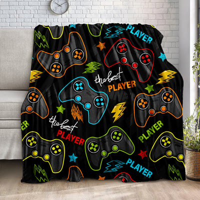 Snuggle up and stay warm with this Gamer Blanket. Crafted with a luxurious flannel material, the Gamepad Blanket style makes it perfect for any game lover. Give it as a gift or keep it for yourself - either way, you will enjoy its soft and cozy feel.