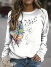 Introducing the Feather Slogan Print Sweatshirt, specifically designed for plus-size women. This fashionable and comfortable sweatshirt features a high-quality feather slogan print that adds a unique touch. Perfect for casual occasions, this smart and stylish sweatshirt is designed to flatter the figure.