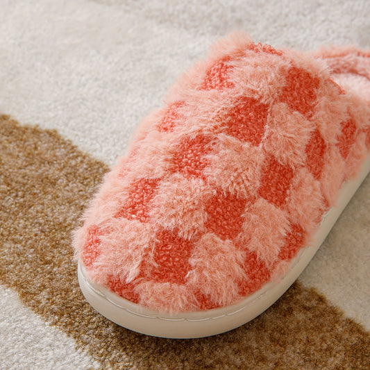 Our Cozy Plaid Pattern Slippers feature a slip-on, round toe design with a non-slip fluffy soft sole. Crafted with a warm home fabric, they provide comfort and style for any occasion.
