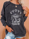 Stay stylish and comfortable through the winter with this women's sweatshirt. The moon and mushroom print adds a unique, feminine touch to a classic silhouette. Casual, long-sleeved, and crew necked, it's perfect for chilly fall and winter days.