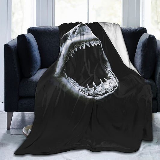 Enjoy absolute comfort with the Shark Ultra-Soft Micro Fleece Blanket. This plush, lightweight blanket is crafted from durable microfiber and is perfect for snuggling up in bed or on the couch. The twin size is perfect for sharing or for those who like to spread out.