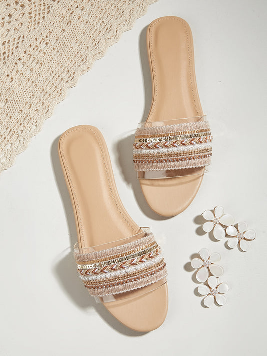 Add a touch of elegance to your summer wardrobe with our Fashionable Apricot Slide Sandals. These stylish slides feature faux pearl and rhinestone detailing, making them perfect for any occasion. Slip them on and enjoy the comfort and sophistication they