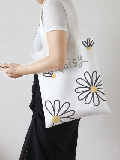 Introducing the Blooming Beauty Shopper <a href="https://canaryhouze.com/collections/canvas-tote-bags" target="_blank" rel="noopener">Bag</a>, perfect for floral enthusiasts and nature lovers. This bag features a large capacity to carry all your essentials and a beautiful floral design. Stay organized and stylish on-the-go with our Blooming Beauty bag.