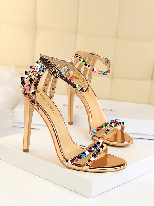Elevate your style with our Funky Spiked Ankle Strap Stiletto Sandals. These edgy sandals feature a unique spike design on the ankle strap, adding a touch of glamour to any outfit. Strut confidently in these statement-making sandals, perfect for any fashion-forward individual.