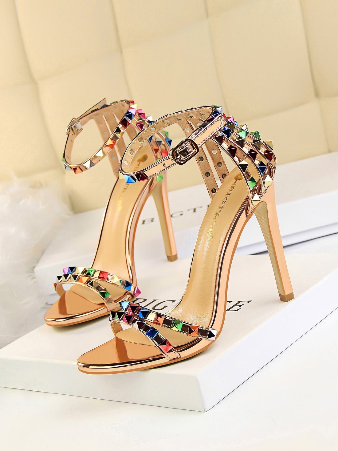 Elevate your style with our Funky Spiked Ankle Strap Stiletto Sandals. These edgy sandals feature a unique spike design on the ankle strap, adding a touch of glamour to any outfit. Strut confidently in these statement-making sandals, perfect for any fashion-forward individual.