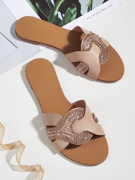 Enhance your summer style with our Rhinestone Adorned Elegant Outdoor Slippers for women. These sandals are the perfect combination of style and comfort, making them the ideal choice for any outdoor excursion. With rhinestone embellishments, these sandals add a touch of elegance to any outfit.