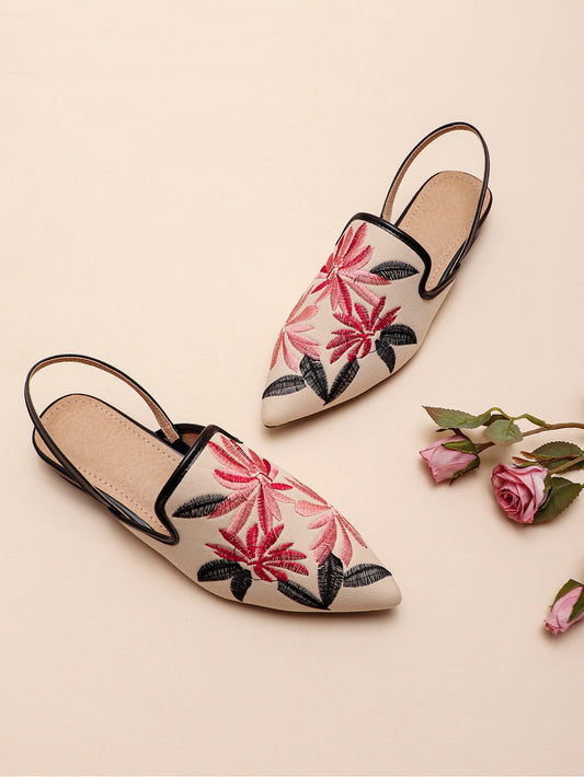 These Floral Embroidered Point Toe Slingback Flats are both chic and comfortable, making them the perfect addition to any outfit. The intricately designed floral embroidery adds a touch of elegance, while the slingback style ensures a secure and comfortable fit. Step out in style with these must-have flats.