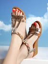 Sparkling Step: Metallic Rhinestone Wedge Sandals for Effortless Glam