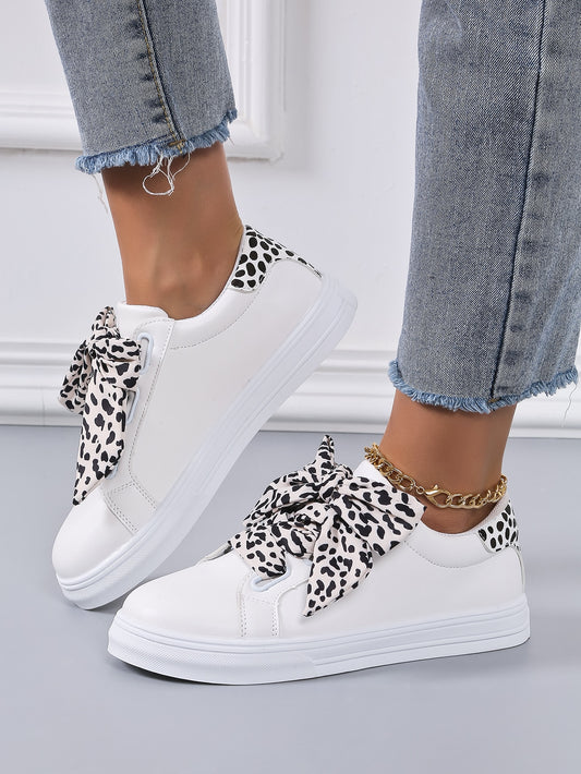 This stylish and fashionable leopard lace-up skate shoe is the perfect accessory for a chic and fashionable look. With a lace-up front and a white sneaker, these shoes are perfect for any fashionista who wants to make a statement.