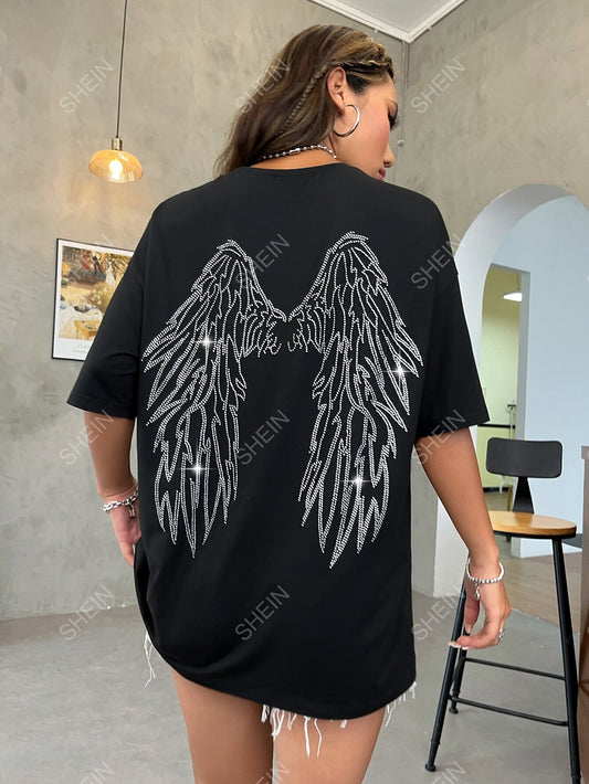 Discover your inner goddess with our Sparkling Wings Drop Shoulder Tee. This versatile and stylish tee features a unique drop shoulder design and sparkling wing detailing, perfect for adding a touch of glamour to any outfit. Embrace your confidence and elevate your style with this must-have piece.