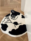 Add a cozy touch to your home with our Soft and Stylish Black and White Cat Patterned Rug. Made with a soft and durable fabric, it's a perfect addition to any room. Transform your space with this charming rug that adds both style and comfort.
