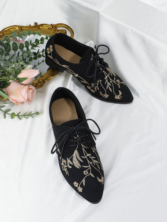 Add a touch of vintage charm to your outfit with our Floral Embroidery Lace-Up Oxfords. These elegant <a href="https://canaryhouze.com/collections/women-canvas-shoes" target="_blank" rel="noopener">shoes</a> feature delicate floral embroidery and classic lace-up design for a timeless look. Crafted with quality materials, these oxfords are not just stylish but also durable. Elevate your style and step with confidence in these lace-up oxfords.