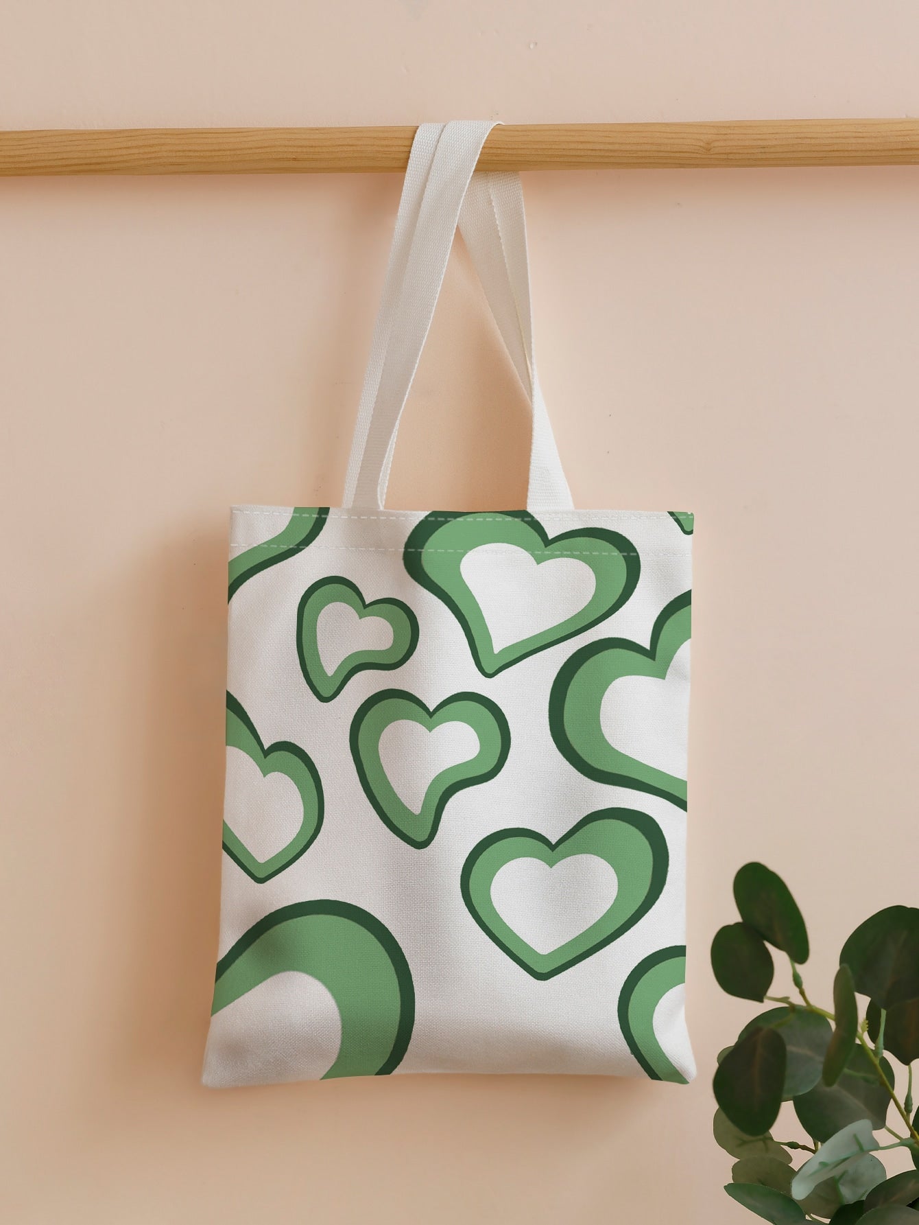 Introducing Love is in the <a href="https://canaryhouze.com/collections/canvas-tote-bags" target="_blank" rel="noopener">Bag</a>: Heart Print Shopper Tote - the perfect accessory for any romantic outing. With its heart print design and spacious interior, you'll be able to carry everything you need while spreading love and style. Made with high-quality materials for durability and comfort. Show your love with this chic tote.