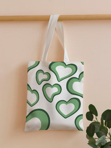 Introducing Love is in the <a href="https://canaryhouze.com/collections/canvas-tote-bags" target="_blank" rel="noopener">Bag</a>: Heart Print Shopper Tote - the perfect accessory for any romantic outing. With its heart print design and spacious interior, you'll be able to carry everything you need while spreading love and style. Made with high-quality materials for durability and comfort. Show your love with this chic tote.