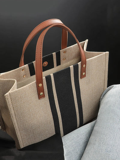 Introducing the Stripe Pattern Shoulder <a href="https://canaryhouze.com/collections/canvas-tote-bags" target="_blank" rel="noopener">Tote</a>, the perfect accessory for those with a classic and timeless sense of style. With a large capacity, this tote is perfect for carrying all your essentials and more. Plus, the stylish stripe pattern adds an elegant touch to any outfit.