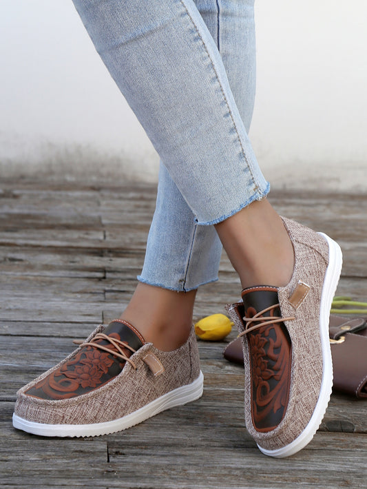 Stay comfortable and stylish in Floral Bliss Lace-Up Casual Shoes. These brown lace-up shoes feature a charming floral print, perfect for your everyday look. Enjoy a breathable upper and cushioned footbed for all-day wear.