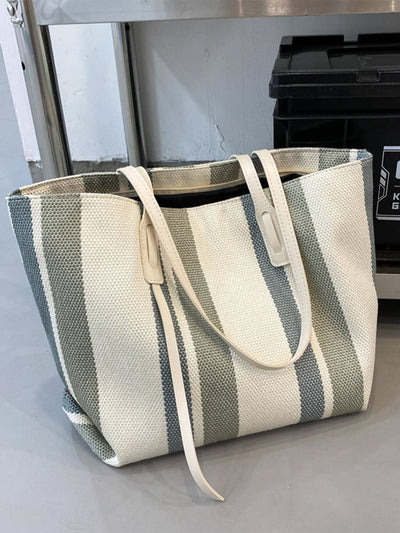 Introducing the ultimate must-have for your wardrobe, the Chic and Striped Shoulder <a href="https://canaryhouze.com/collections/canvas-tote-bags" target="_blank" rel="noopener">Tote Bag</a>. With its stylish design and spacious interior, this bag is perfect for any occasion. Made with high-quality materials, it offers both durability and chic style. Upgrade your look with the Chic and Striped Shoulder Tote Bag.