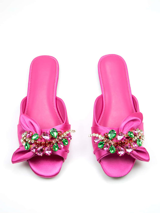 Add a touch of glamour to your outdoor style with Sparkling Glamour: Women's Rhinestone Bow Slippers. These chic slippers not only feature a dazzling rhinestone bow, but also provide comfort and durability for all-day wear. Elevate your fashion game while staying comfortable with these stunning slippers.