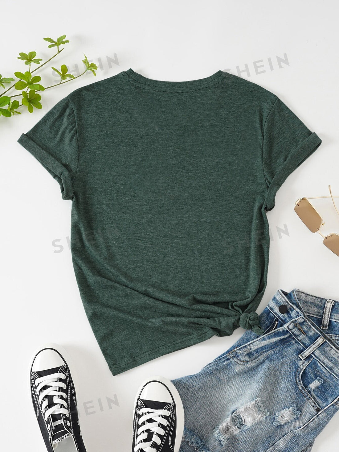 Express yourself with the Heartfelt Messages: Heart and Slogan Graphic Tee. Featuring a heart and slogan graphic, this tee allows you to make a statement with style. Made from soft and durable fabric, it offers both comfort and quality. Perfect for everyday wear or to showcase your personality.
