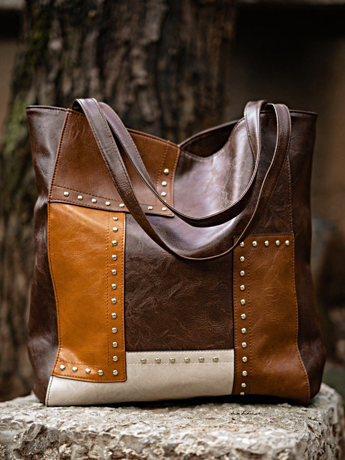 This Retro Colorblock Vintage Patchwork <a href="https://canaryhouze.com/collections/canvas-tote-bags" target="_blank" rel="noopener">Tote Bag</a> is a must-have for any fashion-forward individual. Its unique design adds a touch of nostalgia to your everyday look, while the spacious interior and sturdy shoulder straps make it practical for daily use. Elevate your style with this stylish shoulder handbag.