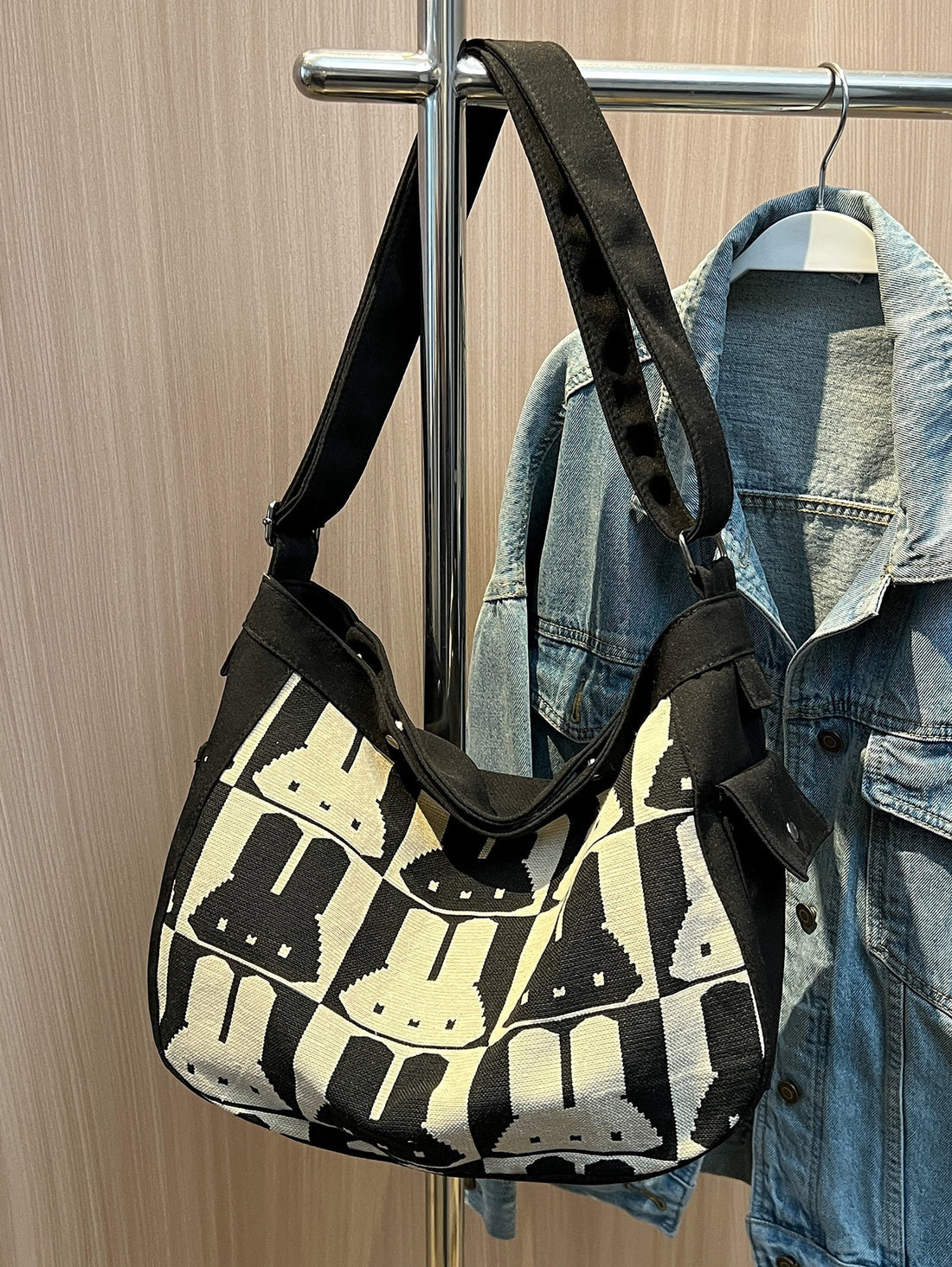 Carry all your essentials in style with our Bunny Decoration Canvas Shoulder <a href="https://canaryhouze.com/collections/canvas-tote-bags" target="_blank" rel="noopener">Bag</a>! With a large capacity, this messenger bag is perfect for students, walking, and festivals. Made with durable canvas and featuring a cute bunny design, it's not only functional but also makes for an ideal gift. Stay organized and look fashionable with our versatile bag.